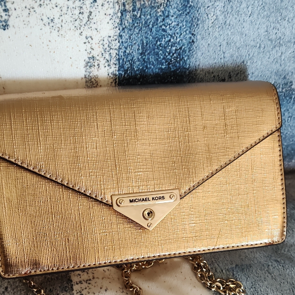 Michael Kors Metallic Gold Grace EnvelopeClutch with Magnetic Closure.